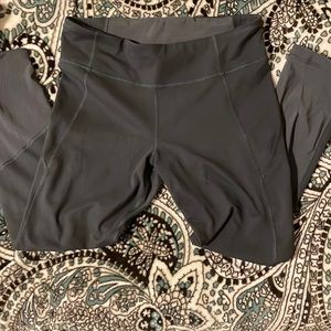 Under Armour tights with mesh calves. Size M